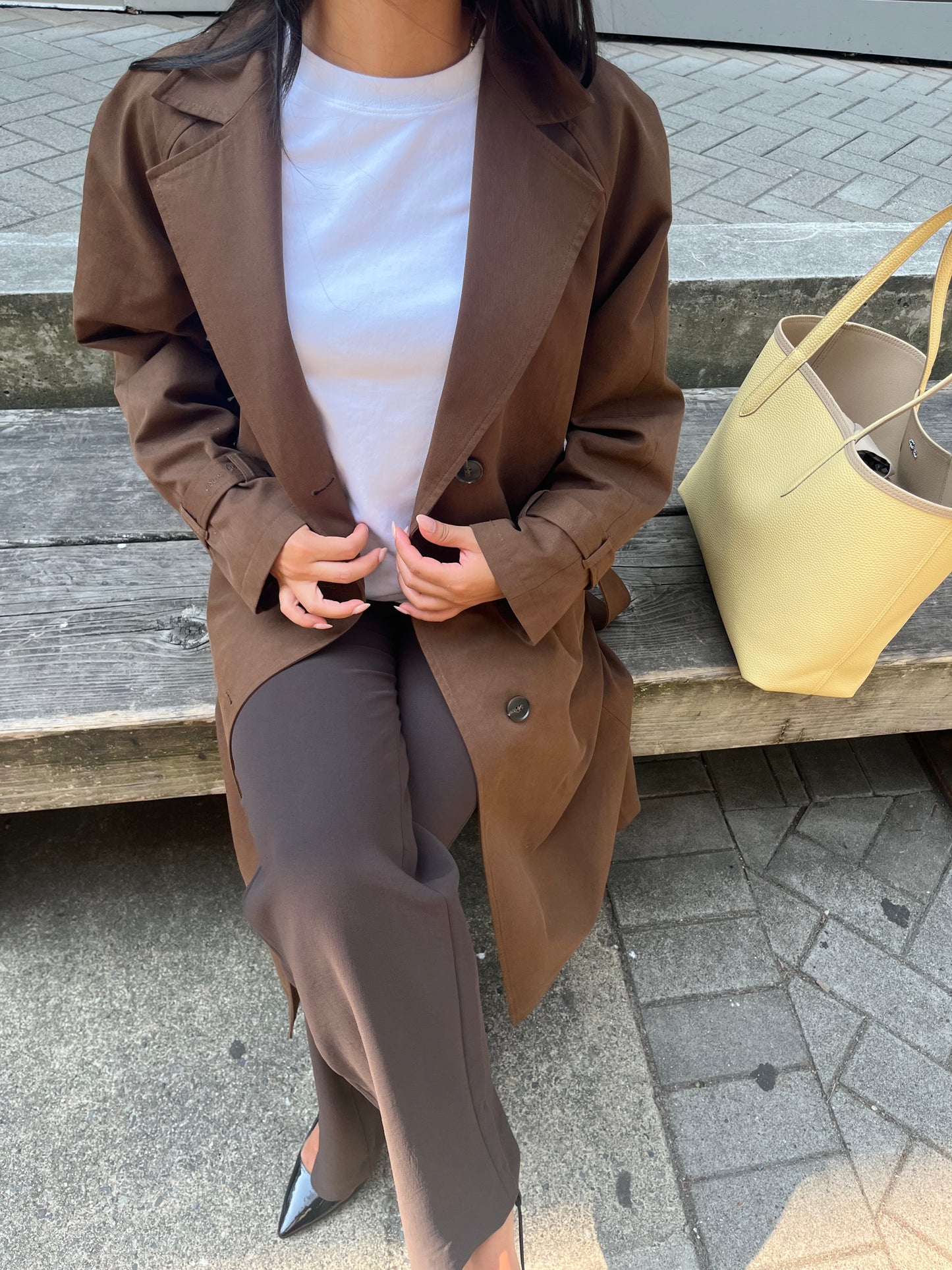 The Signature Trench — women's trench coat on model, full look